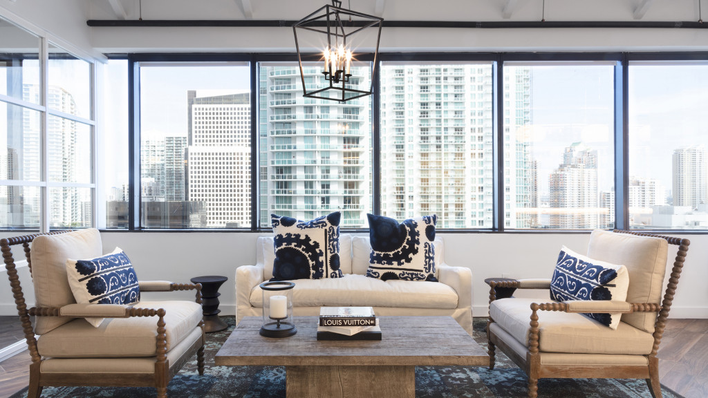 A living room with a large window.